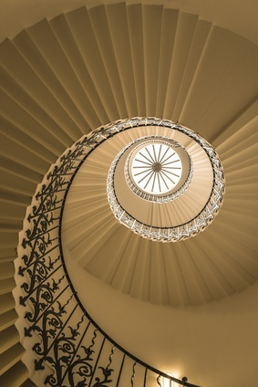A spiral staircase shot from below